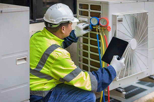 Professional Air Conditioning Repair technician working in Clute, TX